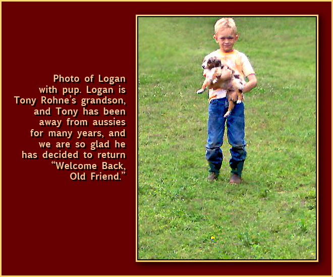 Photo of Logan with pup.
