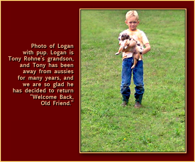 Photo of Logan with pup.